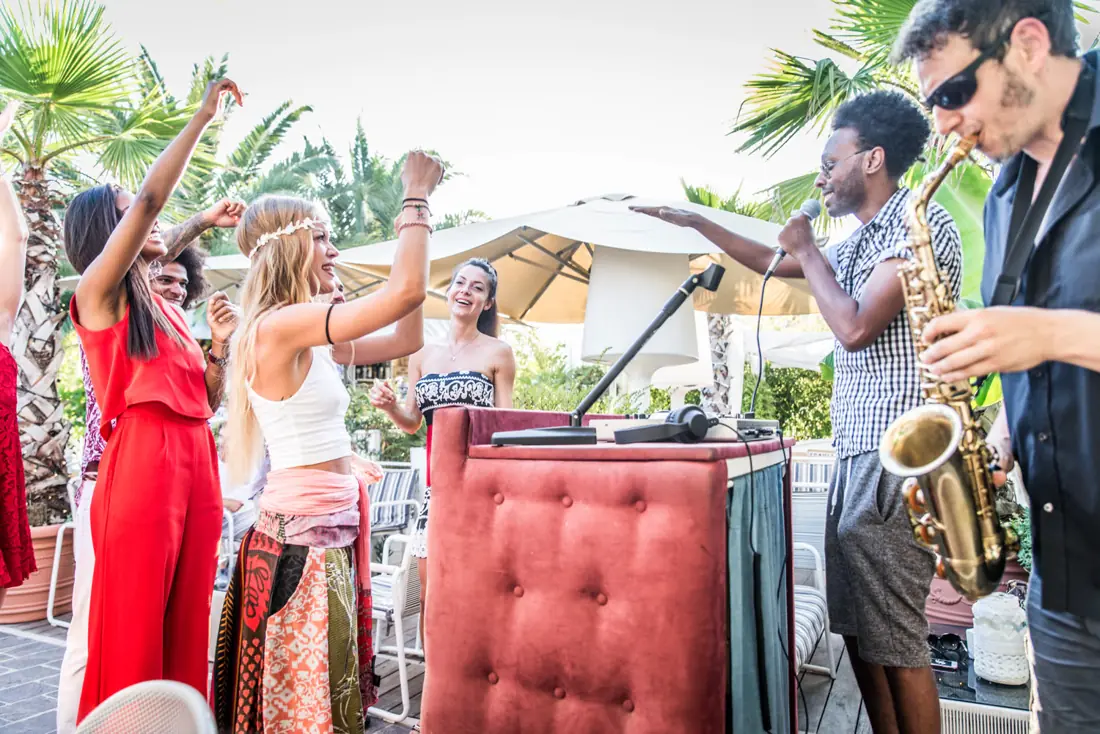 Live music and a crowd on an outdoor patio
